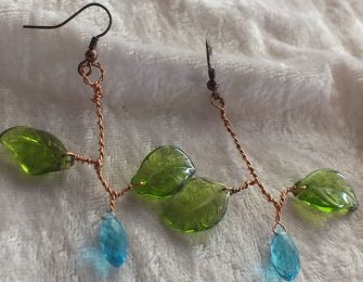 Twisted copper wire, veined glass leaves & faceted bead buds.