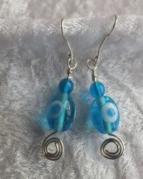 Sterling silver accents these blue painted beads